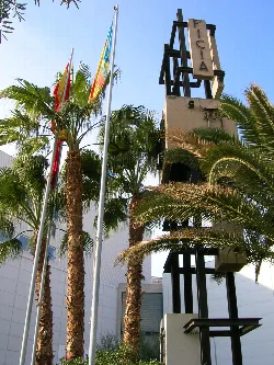 Modern structure and palm trees at the entrance of FICIA in Elda.