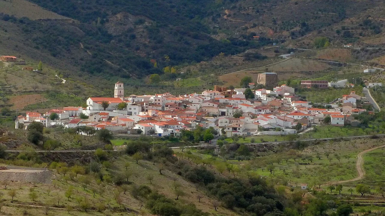 Village of Tahal with white houses in a mountainous landscape.
