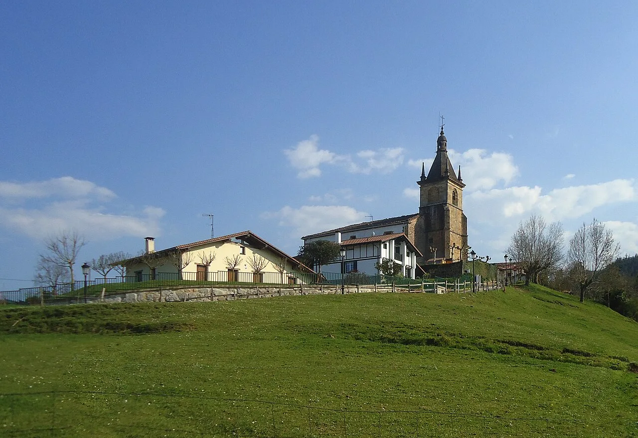 Zeraingo church in Ceráin on a hill with blue sky.