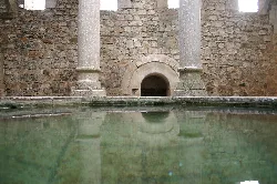 Pool and columns in the Arab baths of Girona from the 13th century.