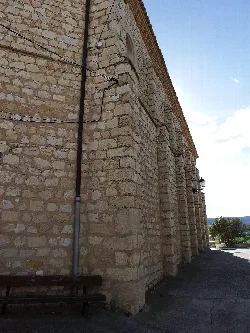Stone facade with arches in La Puebla de Albortón