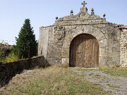 Portal with coat of arms in a house of Celada-Marlantes (Campoo de Enmedio, Cantabria) in Northern Spain
