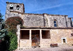 Santa Eugenia Church with tower and clock in Castrillo del Val.
