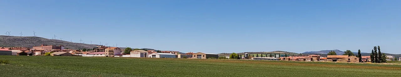 Landscape with houses and buildings in Ólvega, Soria, under a blue sky.