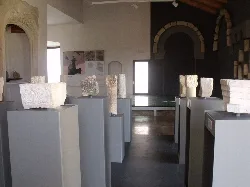Display cases with visigothic artifacts inside the castle.