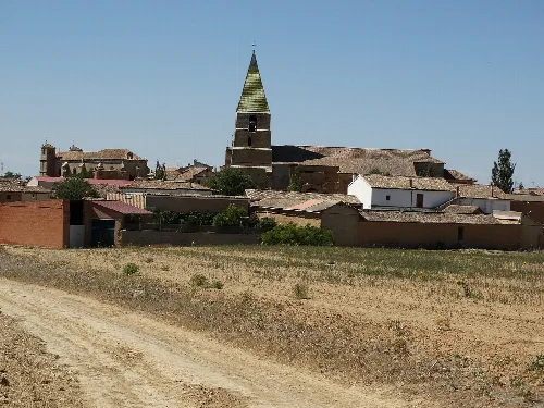 Rural landscape with church and houses in Castromocho, Palencia.