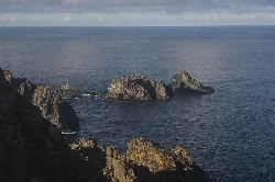Rock formations in the sea seen from a cliff in Ortigueira.