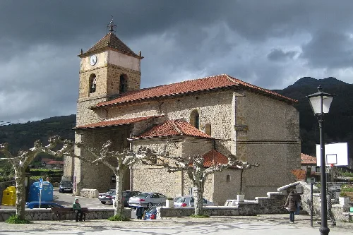 Saint Michael's Church and square in Ogarrio, Ruesga, Cantabria, Spain.
