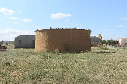 Mud dovecote in an open field in La Unión de Campos.
