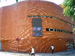 Brick facade of the La Sala Municipal Theatre in Rubí.