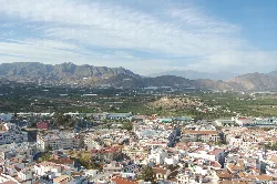 Aerial view of white houses and mountains in Salobreña, Granada.