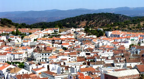 Aerial view of white houses and red roofs in Aracena, Huelva.