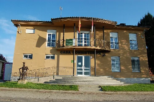 Town hall with flags on the facade.