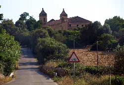 Sant Marçal Church in Marratxí with trees and rural road.