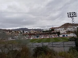 Stadium with football field and athletics tracks in Macael.