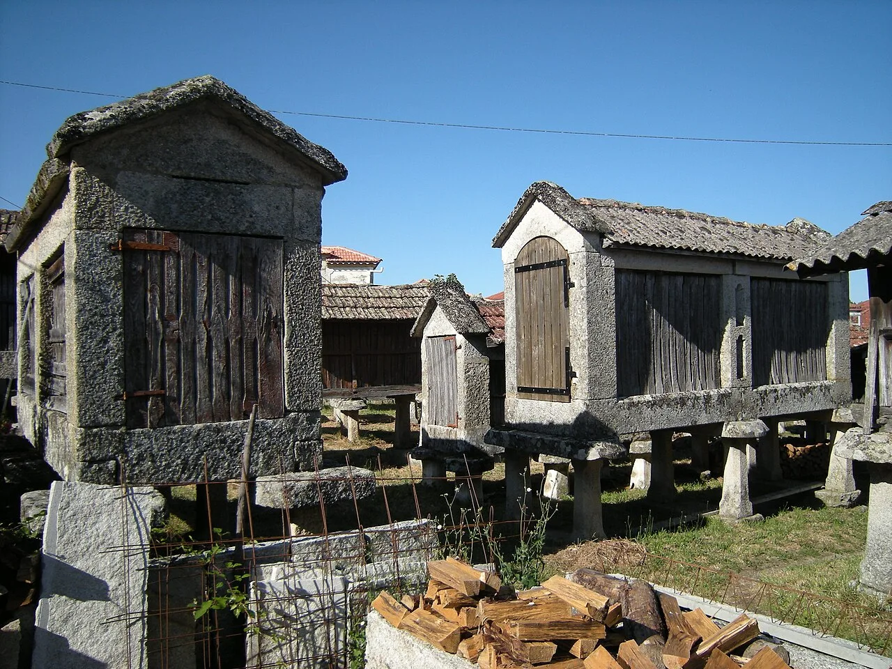 Stone and wooden granaries in Muimenta, Galicia.