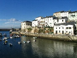 Harbor with boats and white houses in Tapia de Casariego, Asturias.