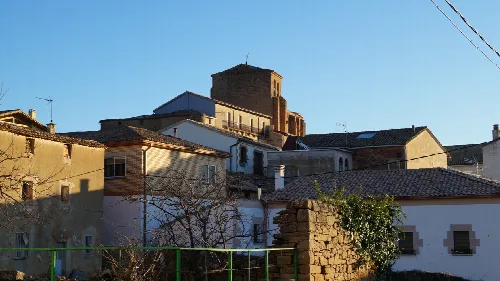 Houses and a tower in a town in Navarra.
