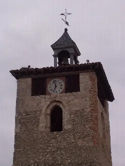 Stone clock tower with bell tower in Peñafiel.
