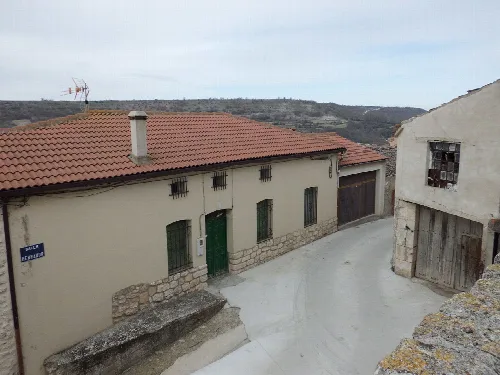 Street in Cuevas de Provanco seen from the church.