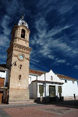 Church with tower and clock in Fontanars dels Alforins.
