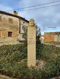 Bust sculpture on a column with inscription in Mahamud.
