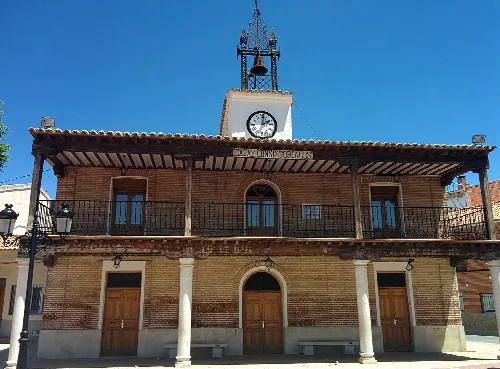 Town hall of Numancia de la Sagra with clock and bell tower.