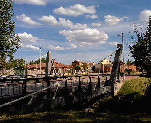 Bridge and houses at the entrance of Saldaña de Burgos.