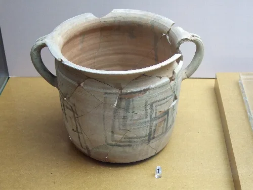 Cylindrical vessel with solar motifs in Zaragoza.