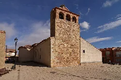 West and north facades of San Pedro Church in Pajares de la Lampreana.