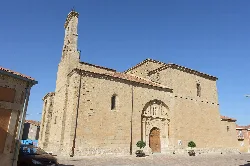 San Juan Bautista church in Fuentesaúco, Zamora, with stone facade and tower.