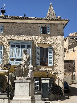 Francesc Alomar sculpture in the Fossar Square, Sineu.