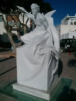 Marble sculpture of a winged man in Carboneras.