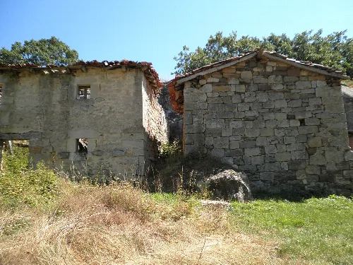 Two stone houses in Presillas, Burgos.