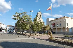Town hall and church in the square of Tamames, Salamanca.