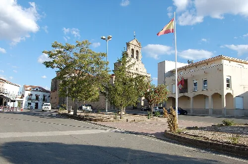 Town hall and church in the square of Tamames, Salamanca.