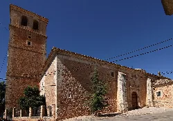 San Andrés Church with tower and stone facade in Campillo de Altobuey.