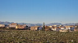 Landscape with houses and mountains in the background in Las Gabias, Granada.