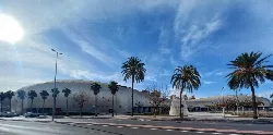 Oval sports arena with palm trees in Cartagena.