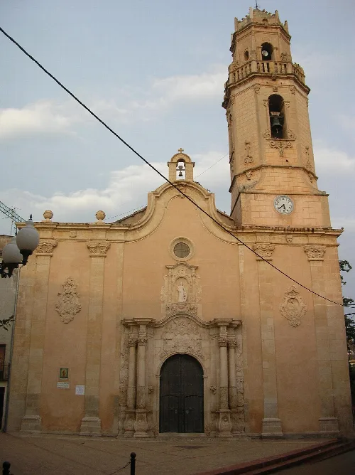 Church with tower and clock in Vinyols i els Arcs, Tarragona.