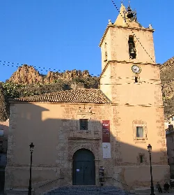 Church with tower and clock in Blanca, Murcia.