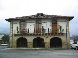 Abadiano town hall with arches on the ground floor and balcony above.