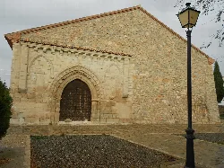 Sangre de Cristo chapel with arched door and stone walls in Sarrión.