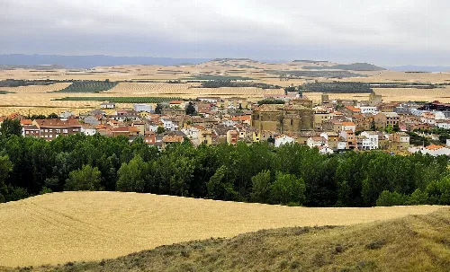 View of Leiva village surrounded by fields and hills in La Rioja.