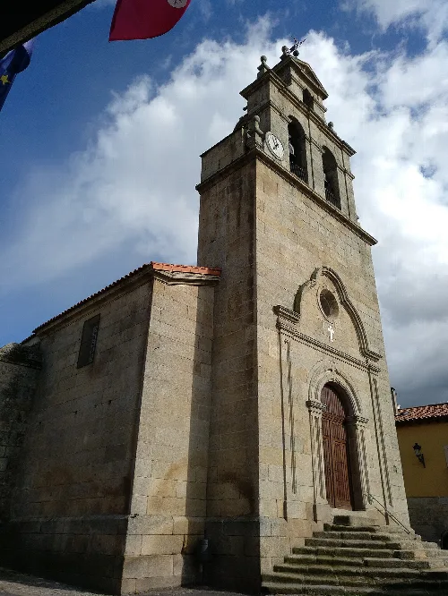 Parish church of Mieza with tower and clock in Salamanca.