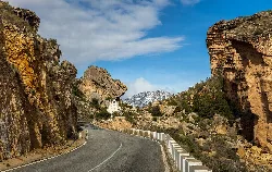 Road surrounded by rocks and mountains in Fortuna, Murcia.