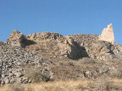Castle on a hilltop with blue sky in Monóvar, Alicante.