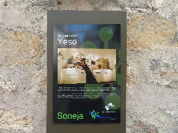 Sign for the Gypsum Museum in Soneja with text and exhibit image.