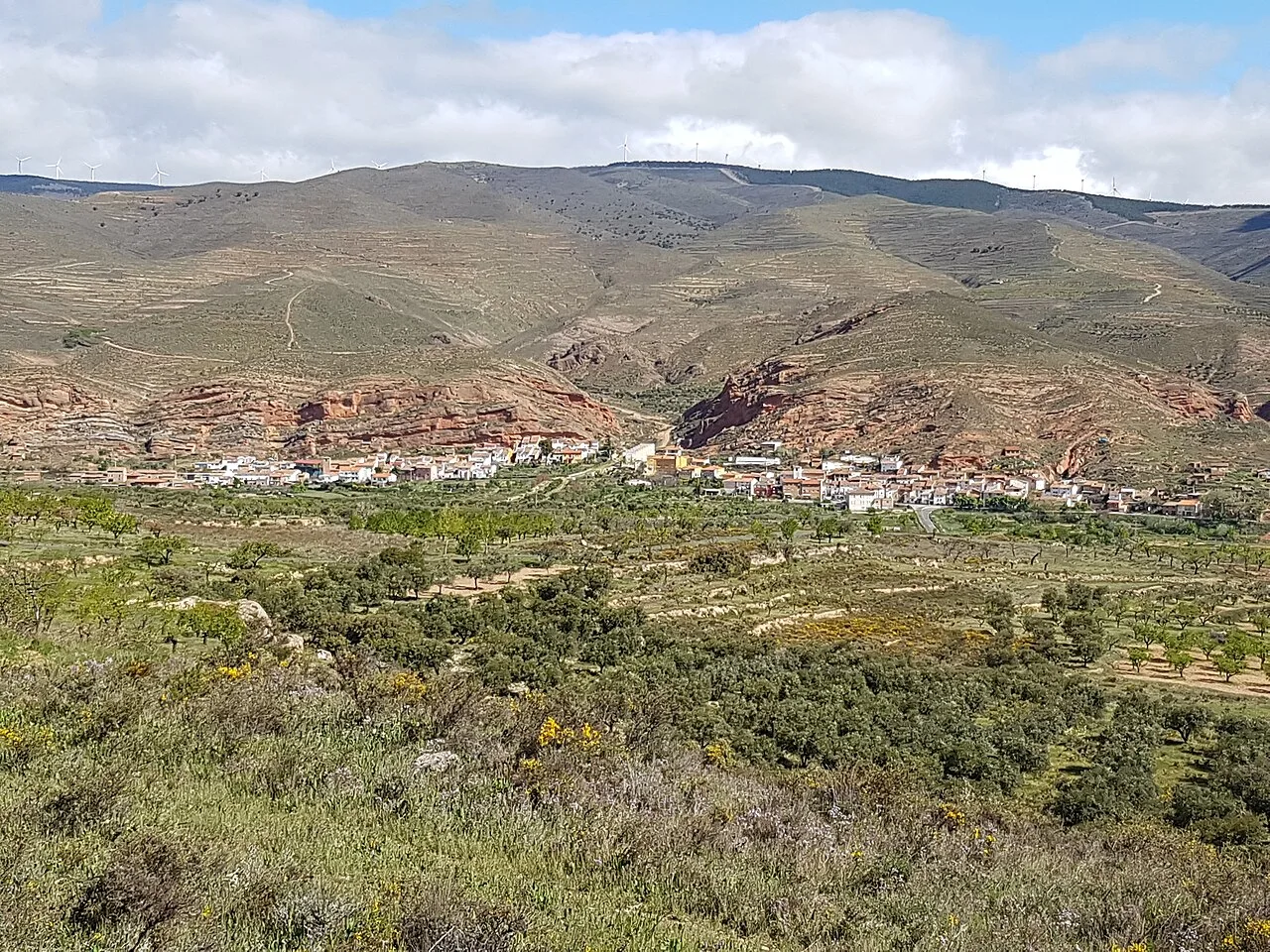 General view of Santa Eulalia Bajera, village in Spain, as seen from vía verde de Préjano.