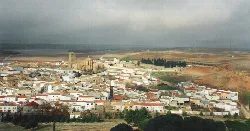 Panoramic view of Belmonte from the castle, with white houses and hills in the background.